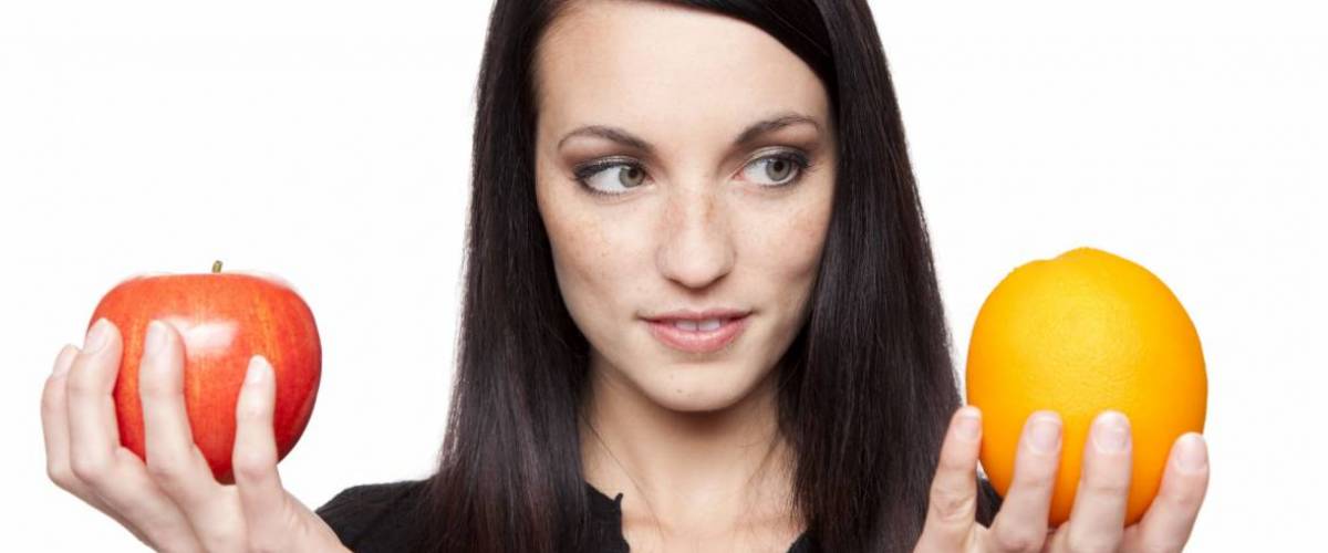 Woman compares apples and oranges