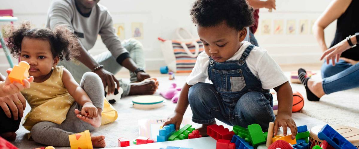 Diverse children enjoying playing with toys