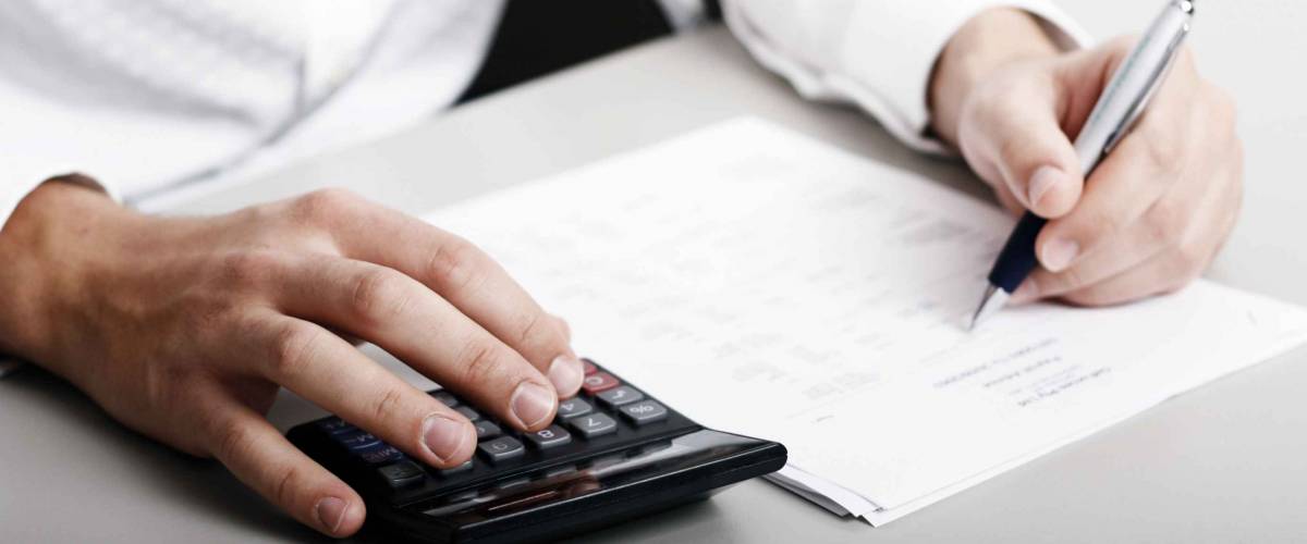 male in white shirt completing a blank form