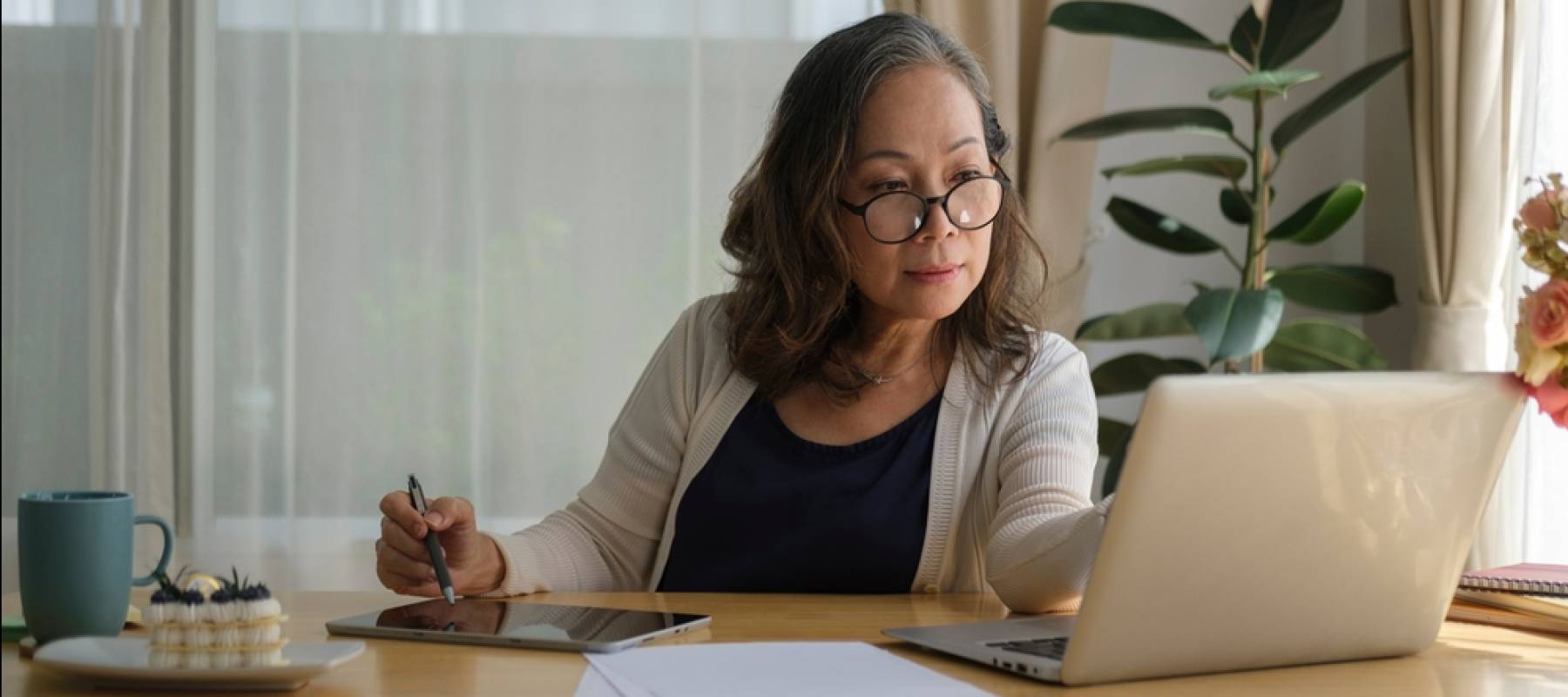 Senior mature woman on laptop
