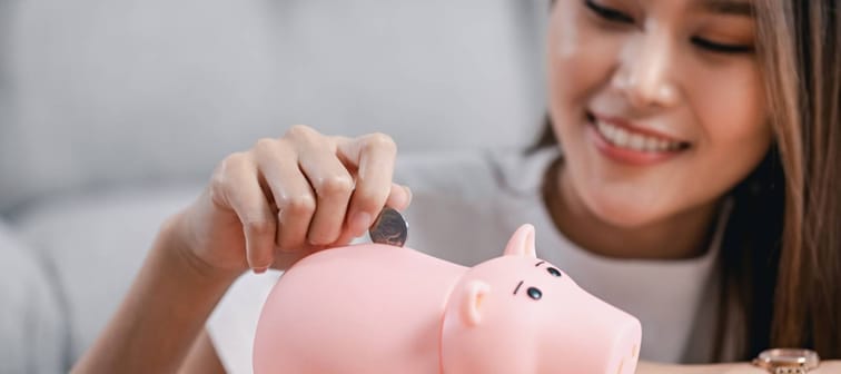 Woman saving money