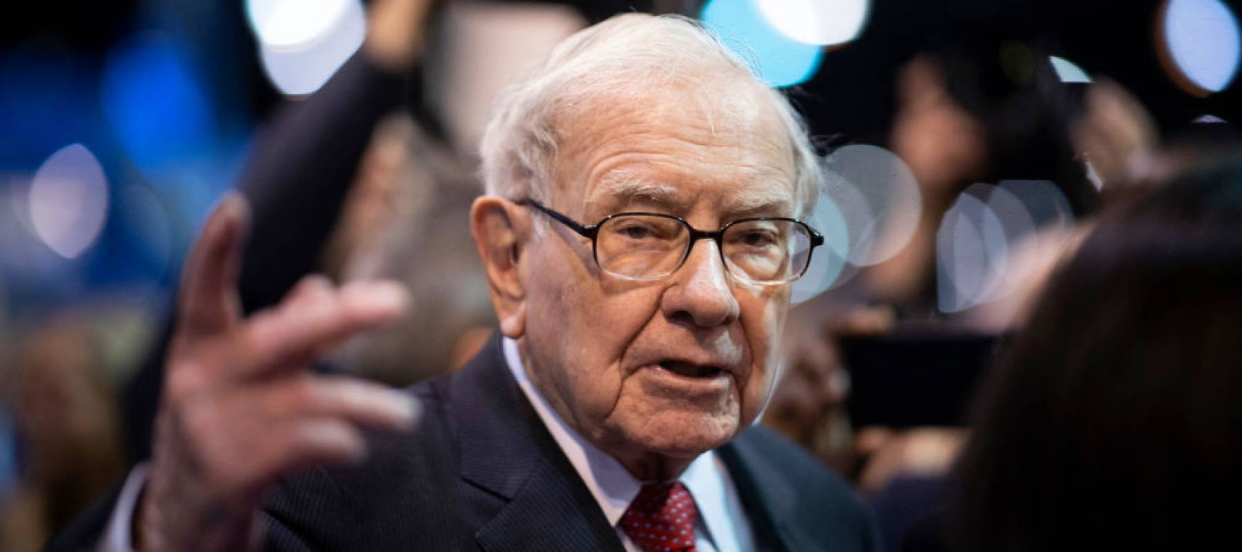 Warren Buffett, CEO of Berkshire Hathaway, speaks to the press
