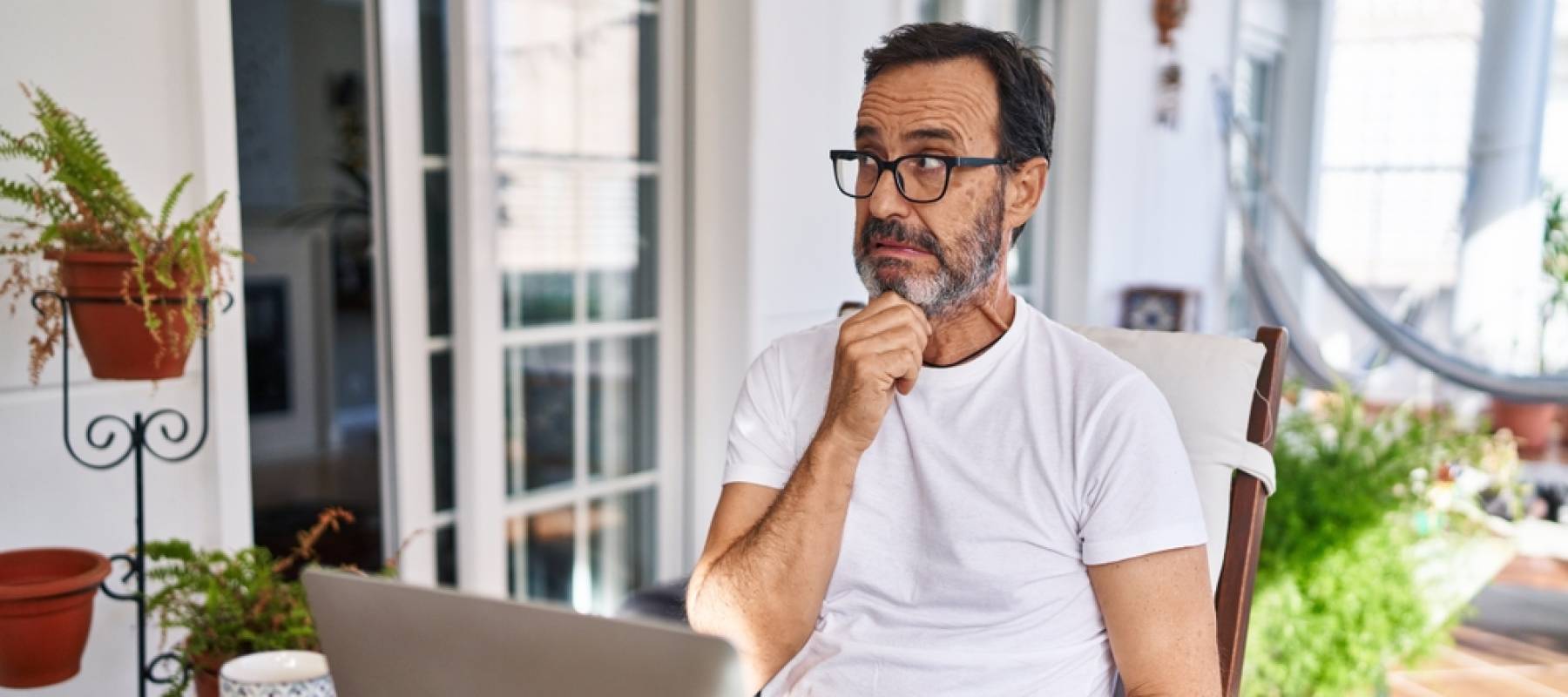 Middle aged man on computer