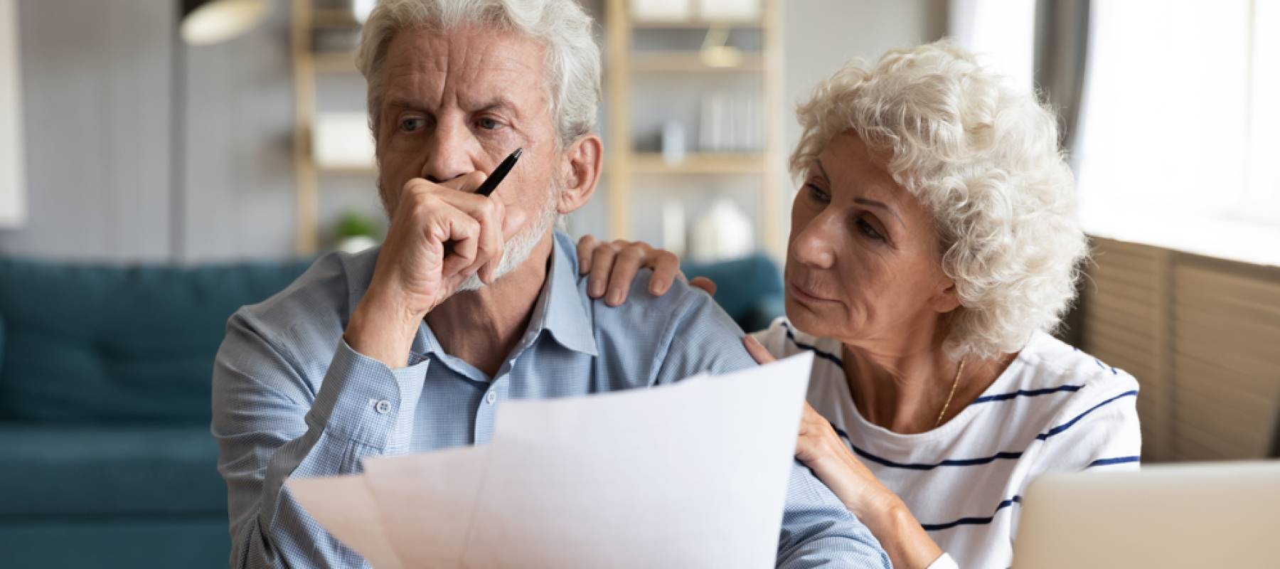 stressed elderly couple