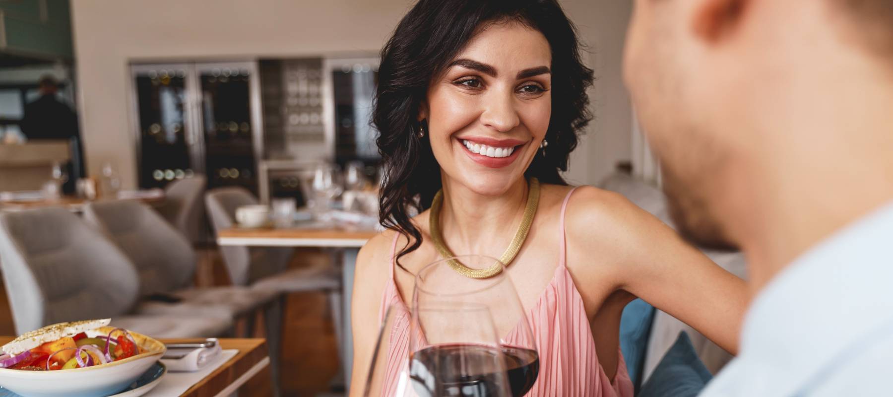Woman enjoying wine on the couch