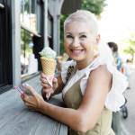 Older woman buying ice cream