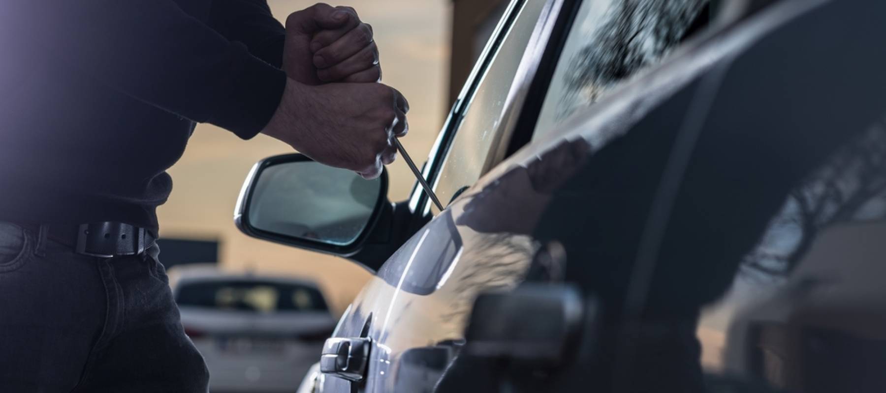 Man trying to break into car