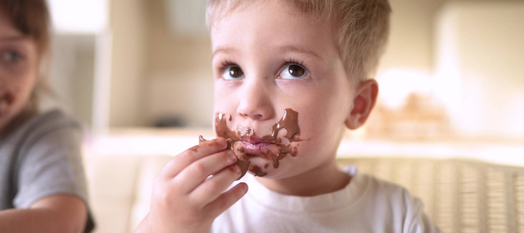 Little boy enjoying chocolate