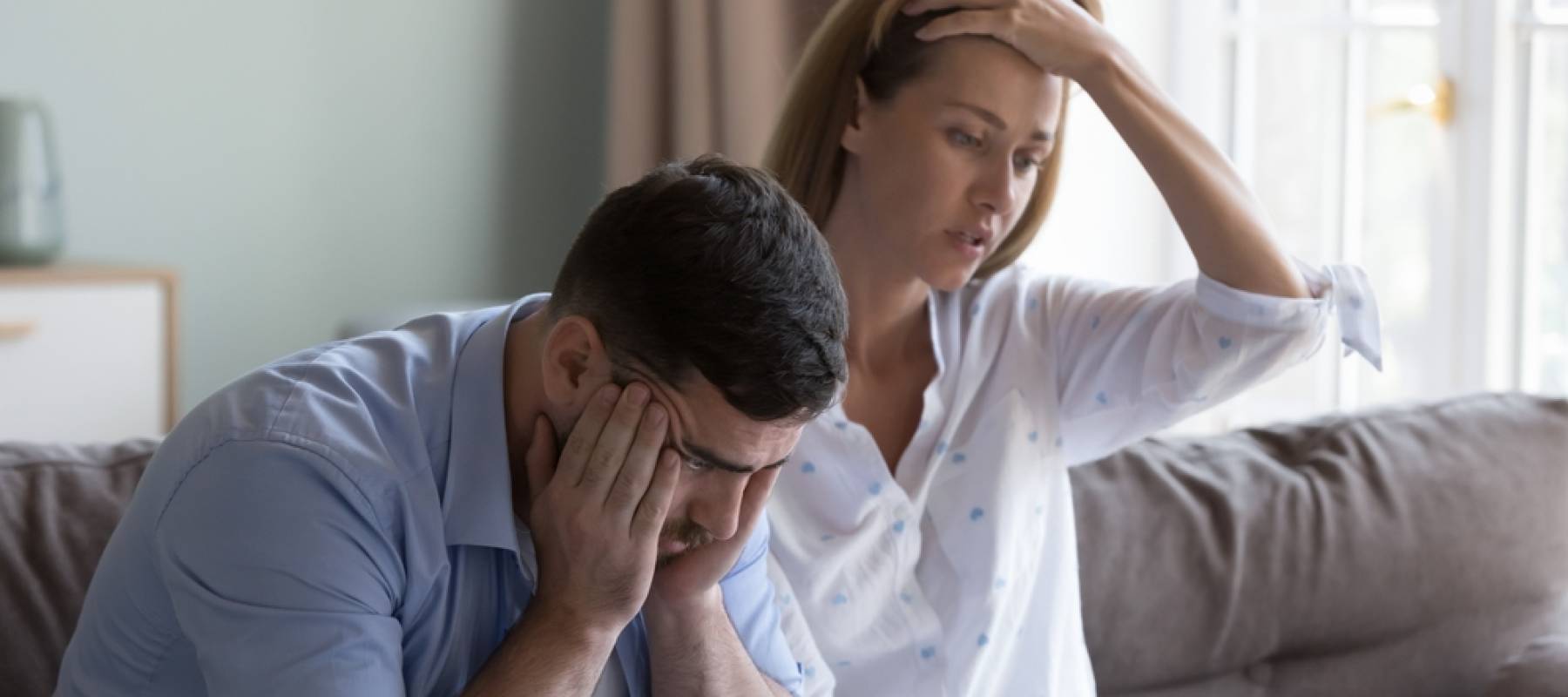 Couple looking stressed