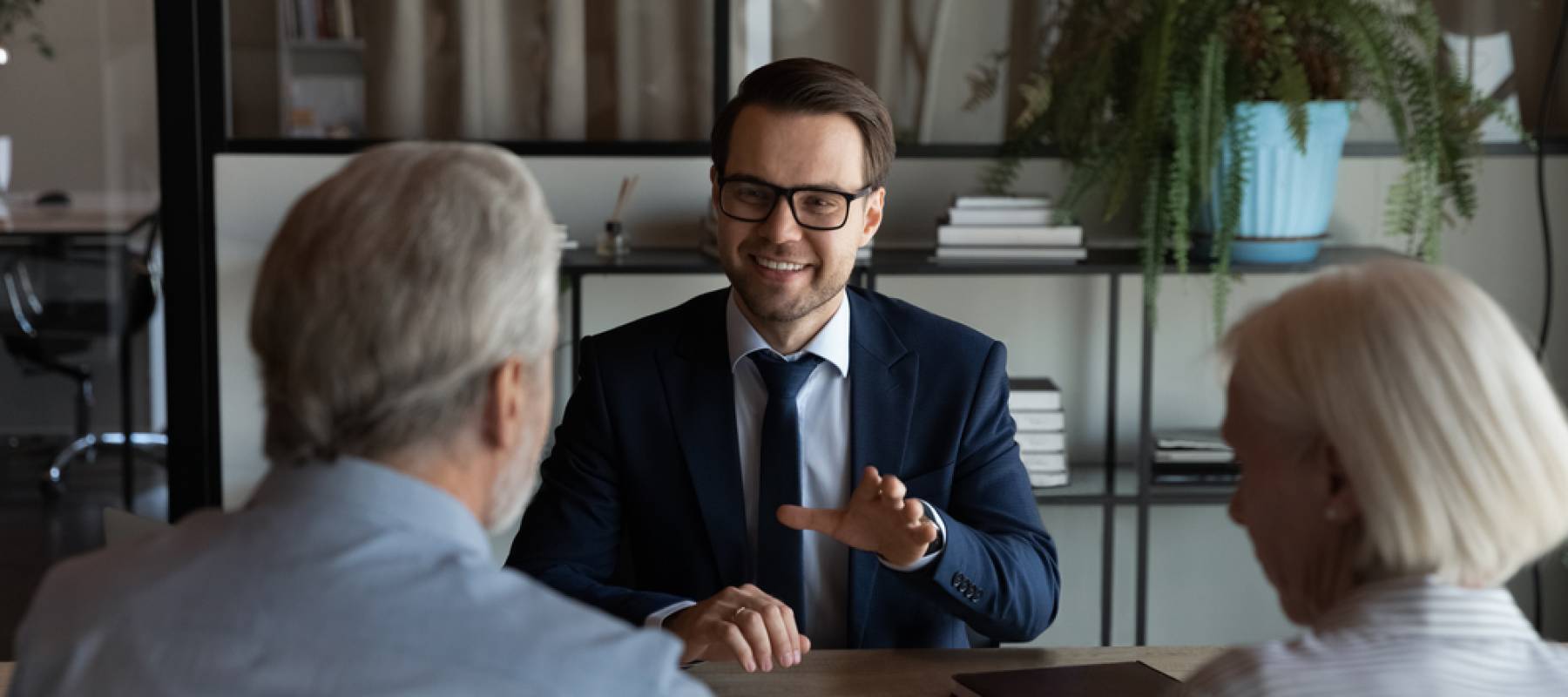 Older couple planning for retirement with an advisor