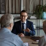 Older couple planning for retirement with an advisor