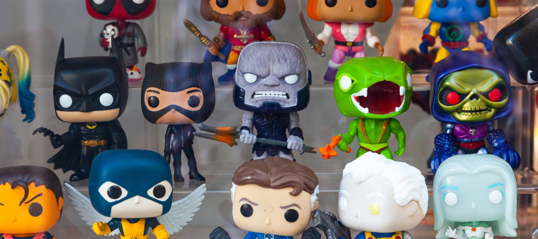 Motril, Spain - 09.24.2022: Collectible figurines of funko pop on a shop window, close-up.