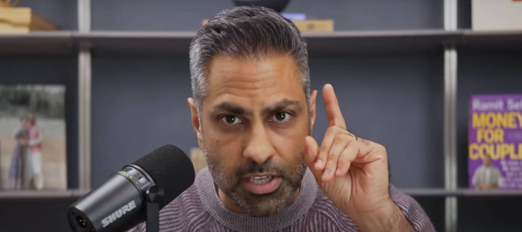 Ramit Sethi addresses the camera to discuss his 9 money milestones.