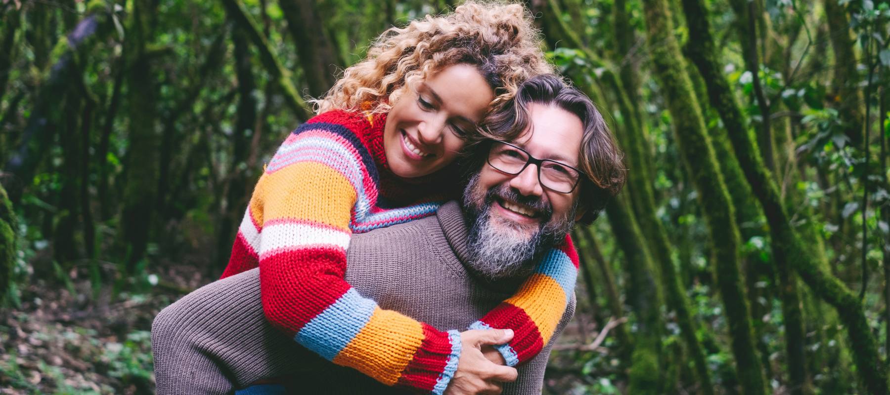 A couple hiking outdoors.