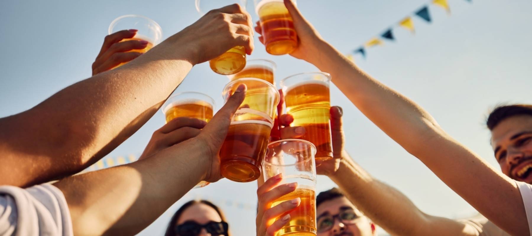 Friends cheersing with Ontario craft beer