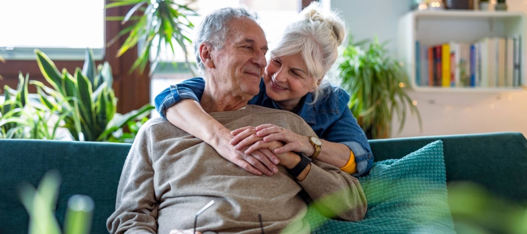 Happy senior citizens in their home