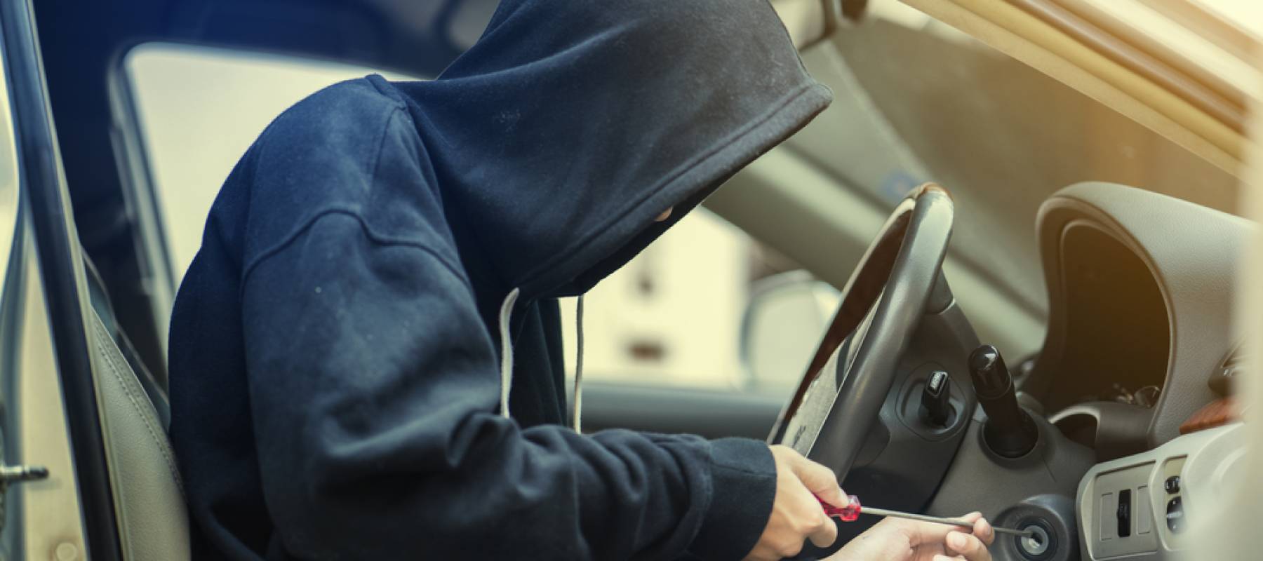 Man stealing a car