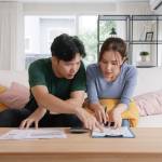 Young couple crunching numbers