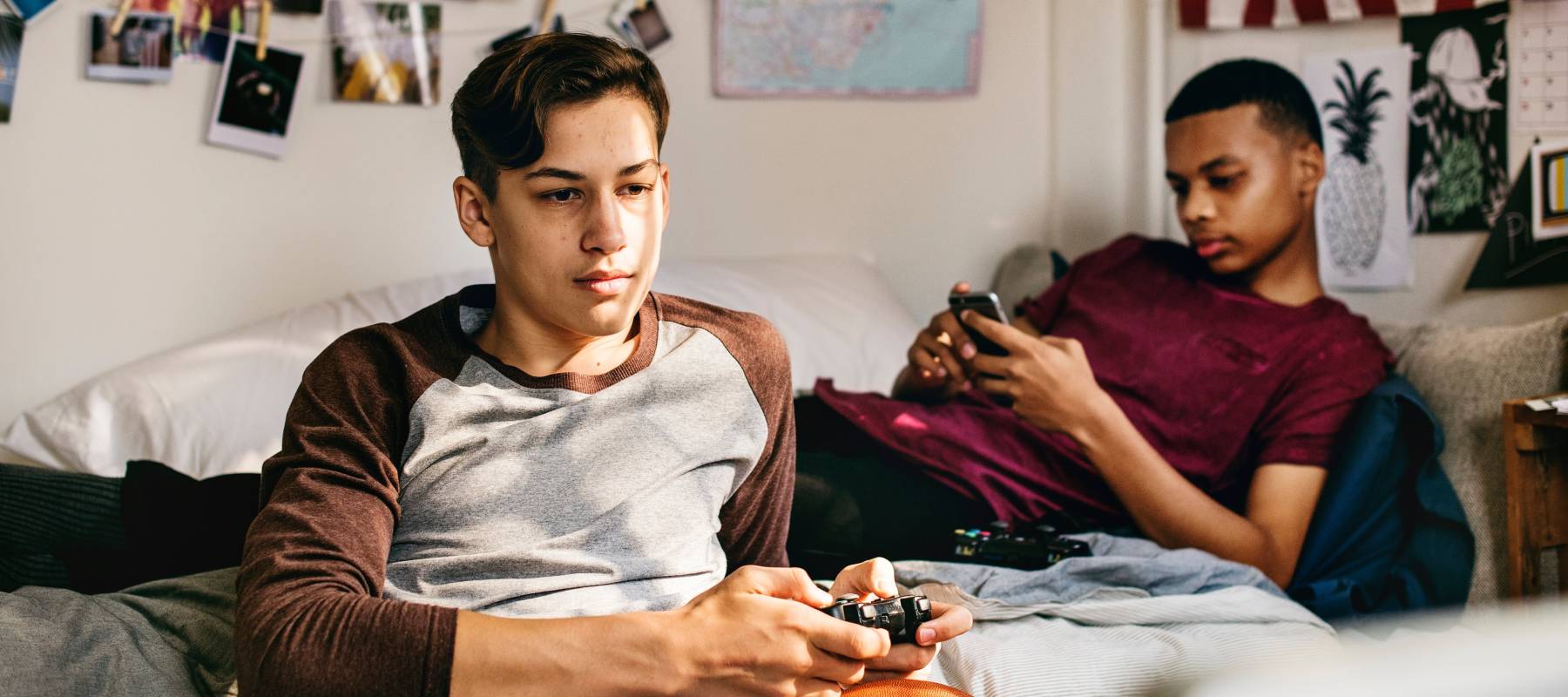 Two young men playing video games