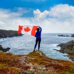 Woman holding Canadian flag