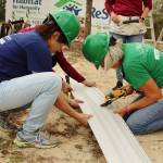 Two women building home