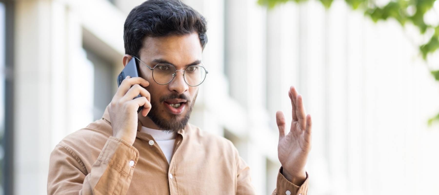 Frustrated man on phone