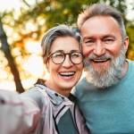 Selfie of older couple on a hike