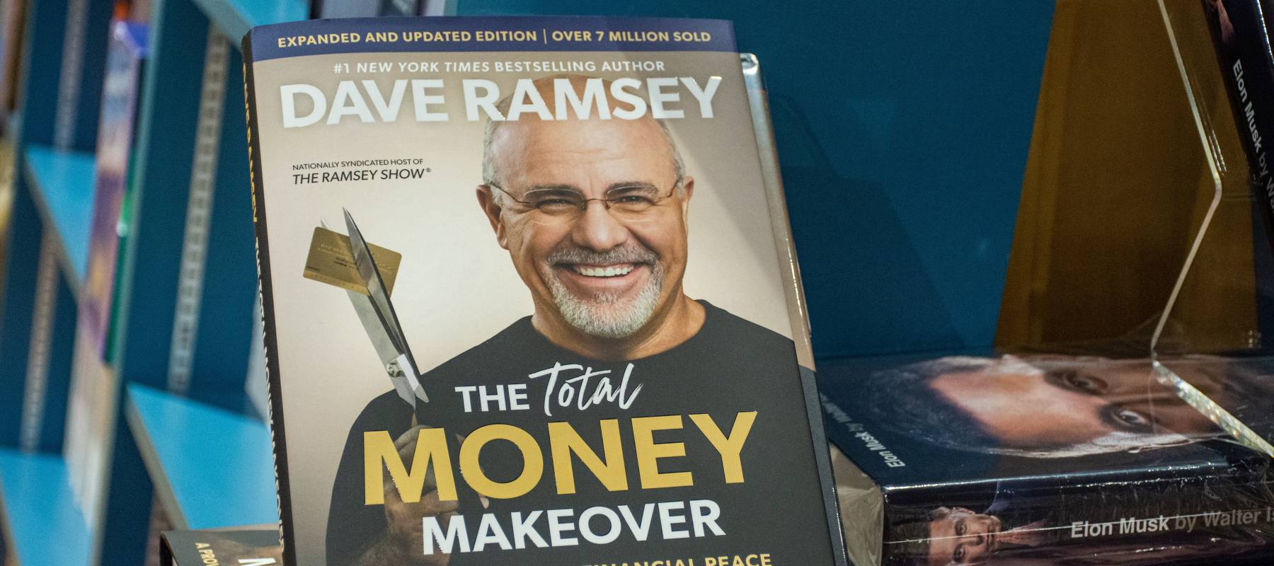 Close-up Dave Ramsey's The Total Money Makeover book in the bookstore