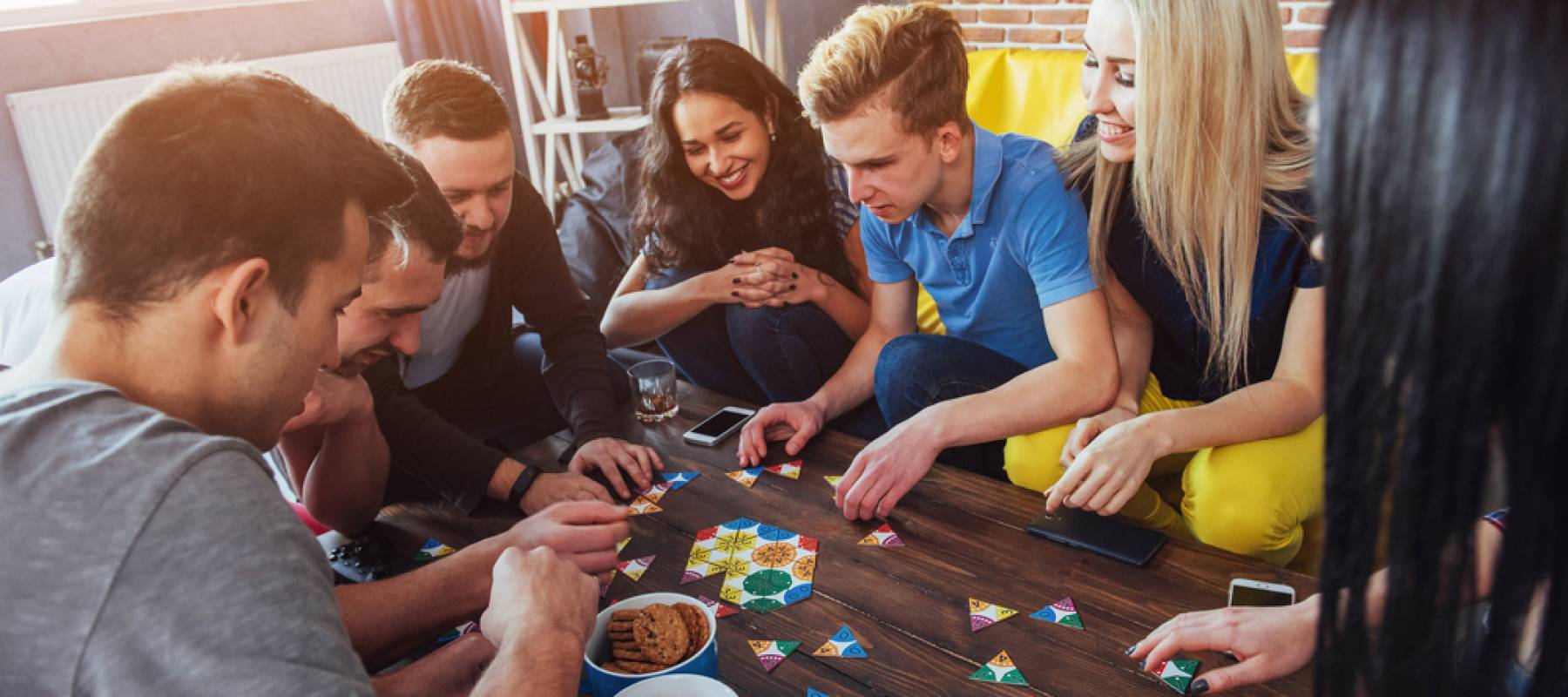 Young adults playing poker