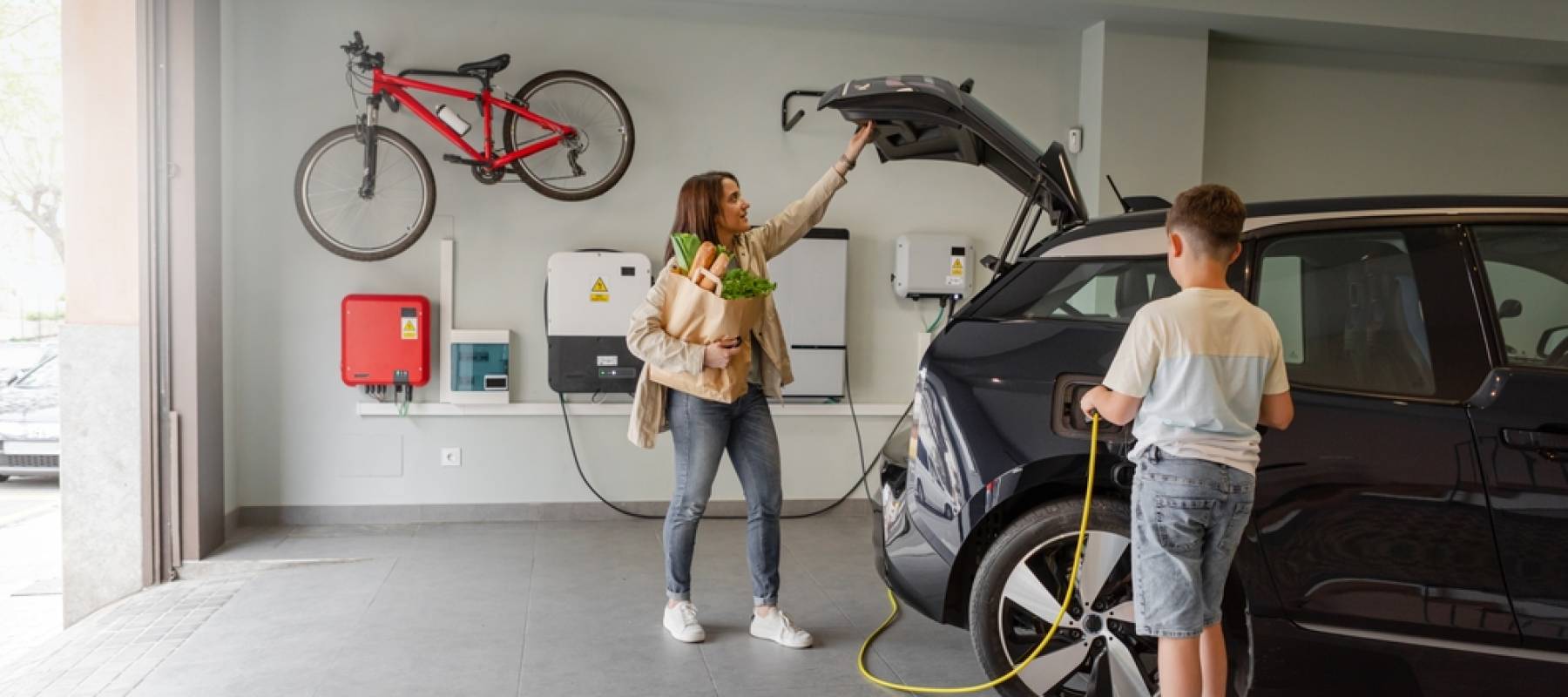 Child plugging in an EV