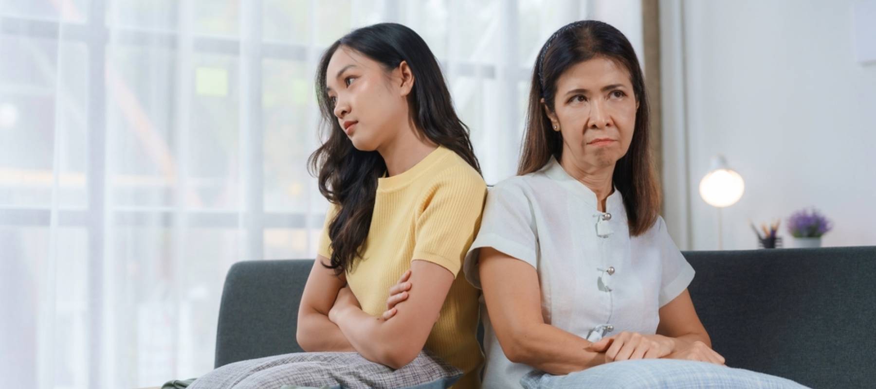 Woman and child looking annoyed