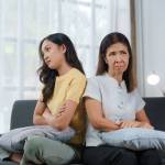 Woman and child looking annoyed
