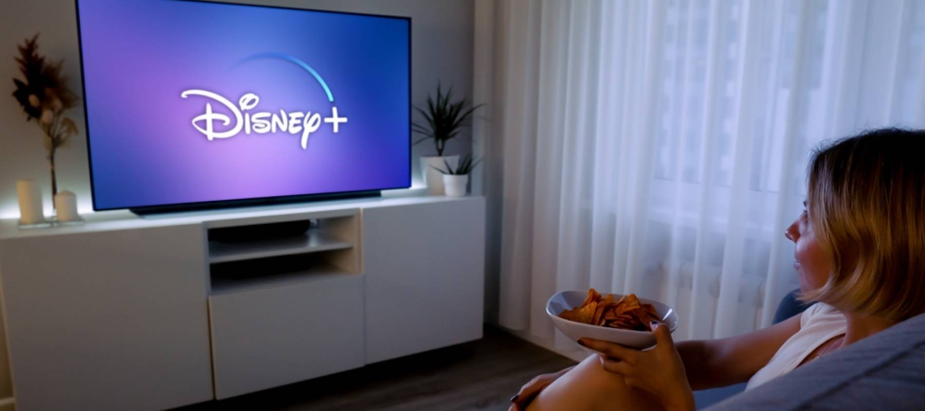 Woman watching Disney+