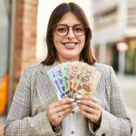 Woman holding money