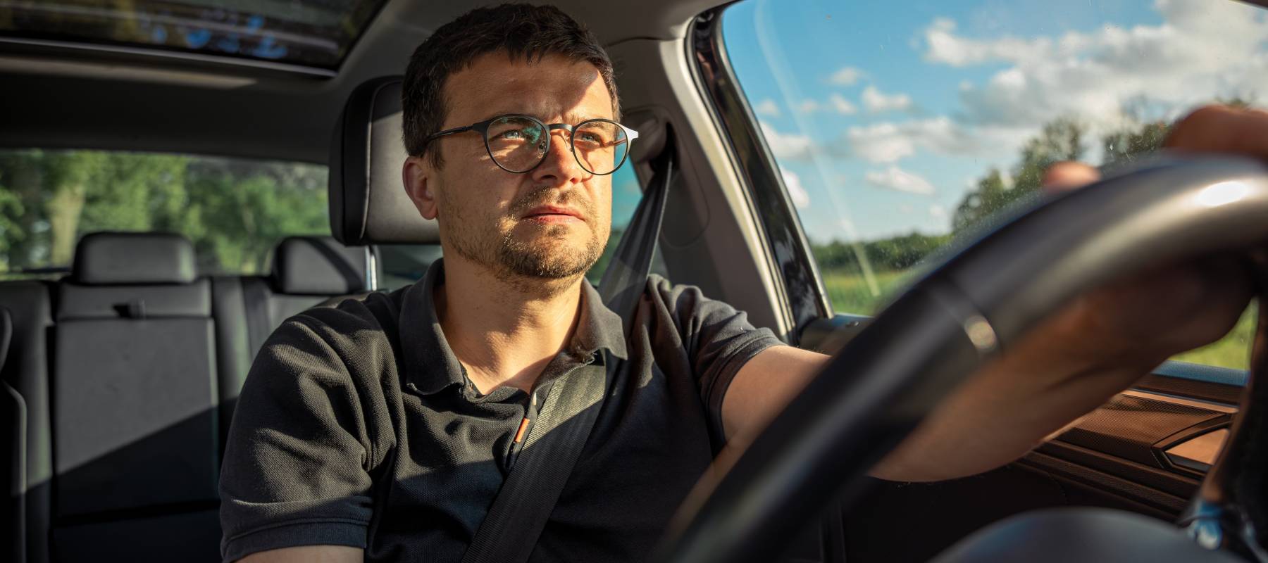 Driver in car interior