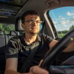 Driver in car interior