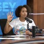 Ramsey Show hosts taking a call