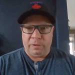 Man being interviewed