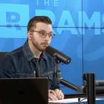 Ramsey Show hosts Rachel Cruze and George Kamel react with shock after hearing a caller pays their in-laws $6K a month to cover their mortgage.