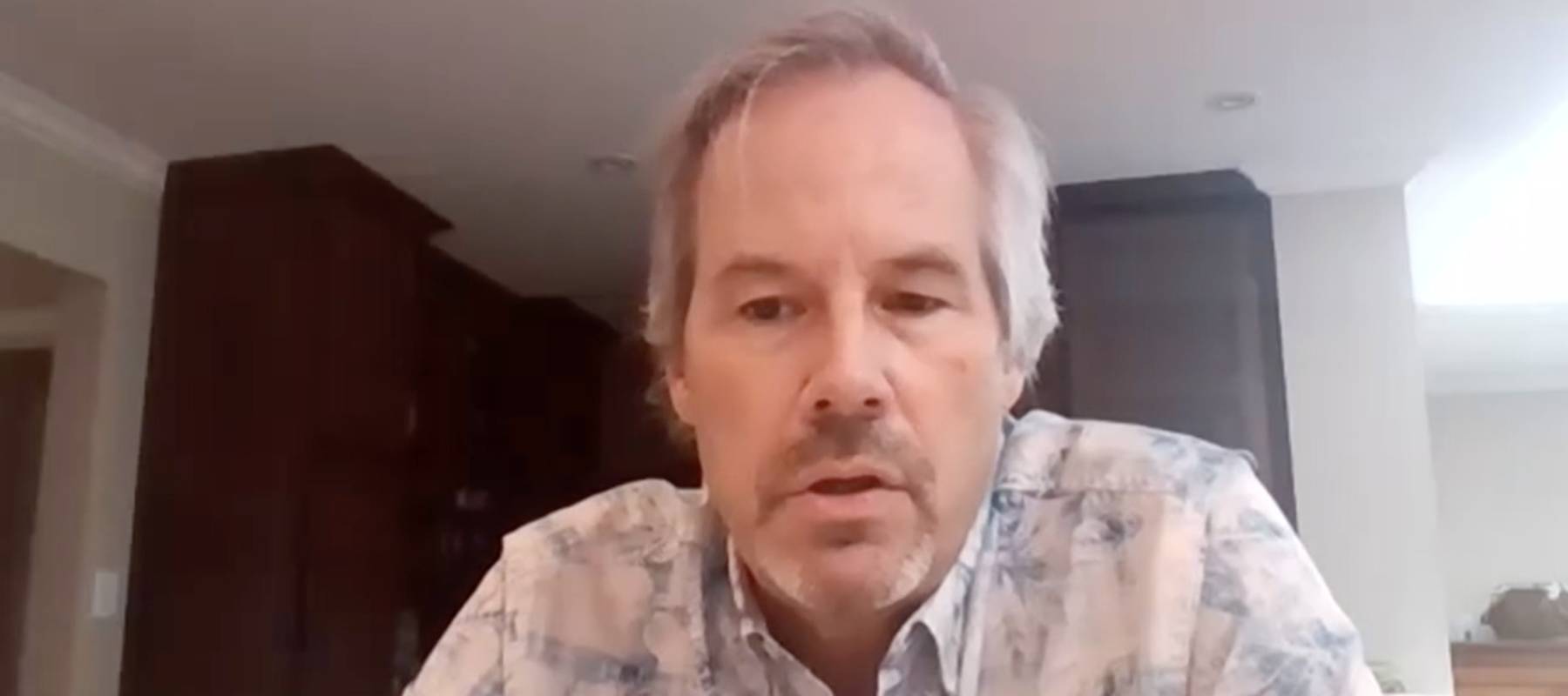 Man being interviewed