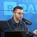 Ramsey Show hosts taking a call