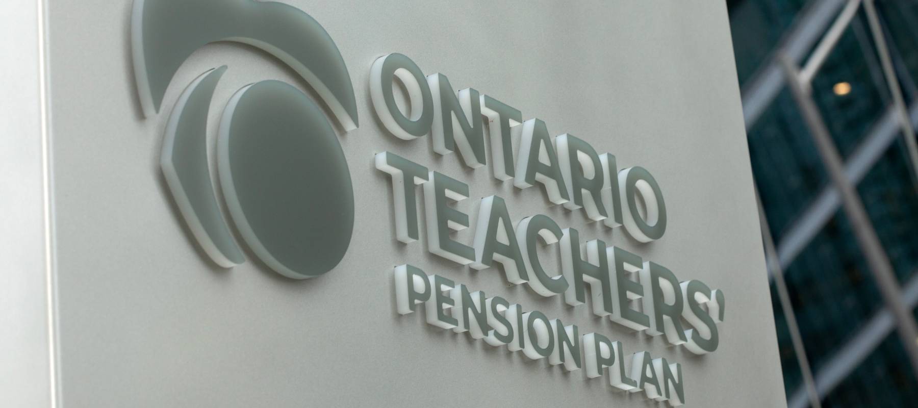 TORONTO, CANADA - 2024 August 4: Ontario teachers Pension Plan plate at their office building at 60 Front St W in Toronto, Ontario.