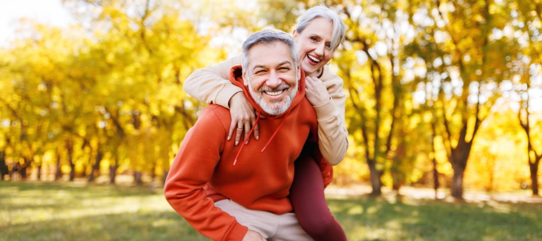 Retired couple smiling male and female