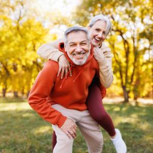 Retired couple smiling male and female