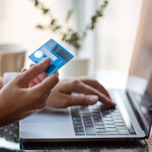 Person holding credit card