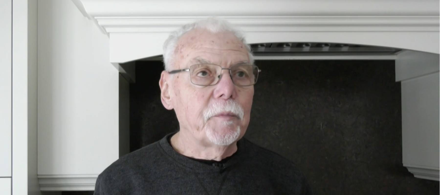 Man being interviewed on TV