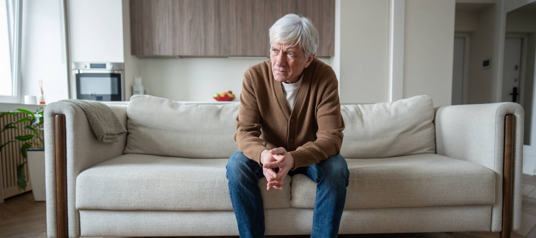 Retired man looking pensive