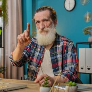 Retired man with long hair