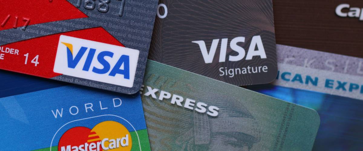 LA, CA, USA - May 26, 2016: Credit card is a method of payment that issuer grants a line of credit to the cardholder, from which the cardholder can borrow money for payment to a merchant.