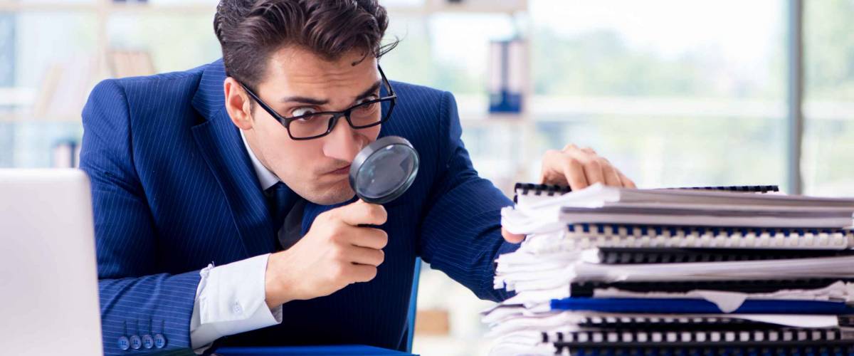 Auditor looking for errors in the financial statements